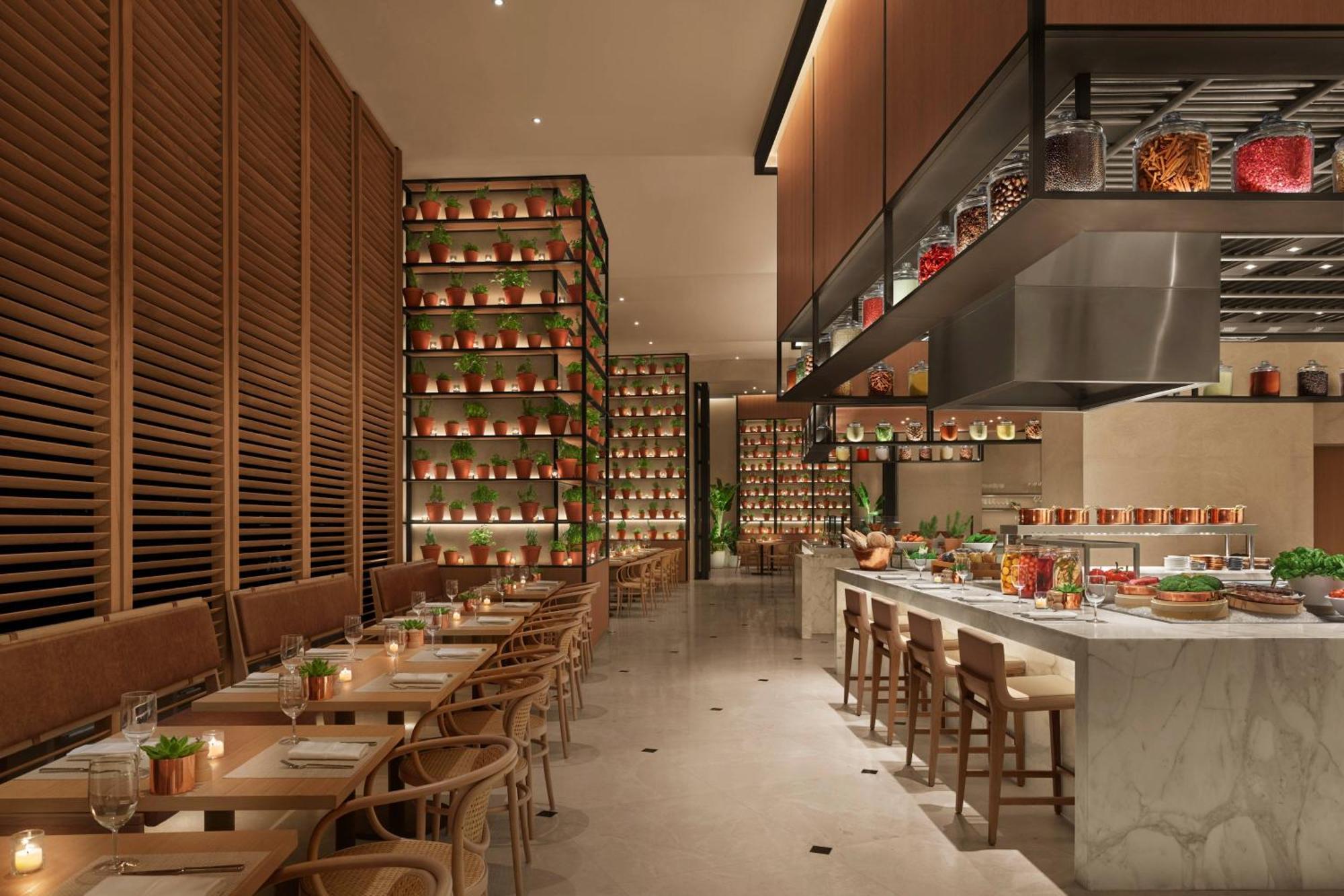 The Abu Dhabi Edition Esterno foto The interior of the restaurant